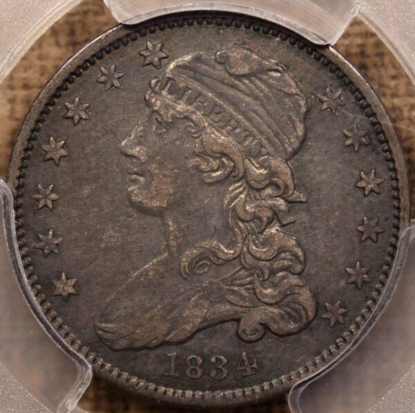 1834 B.1 O/F Capped Bust Quarter PCGS AU50, ex. Newman